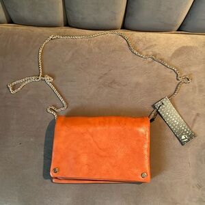 NWT Street Level Faux Leather Crossbody With Gold Chain in burnt orange